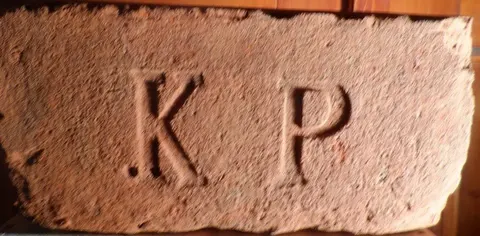 Značka K P