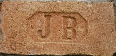 Značka J B