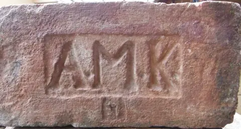 Značka A.M.K.