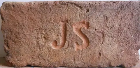 Značka J S
