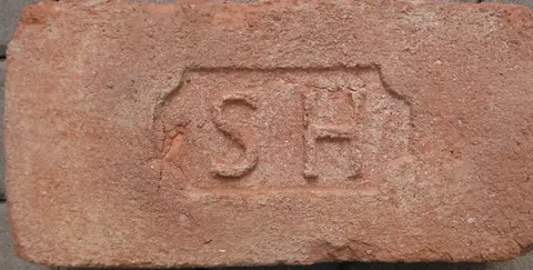Značka S H