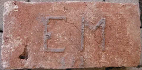 Značka E M