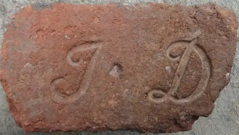 Značka J D