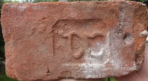 Značka J T