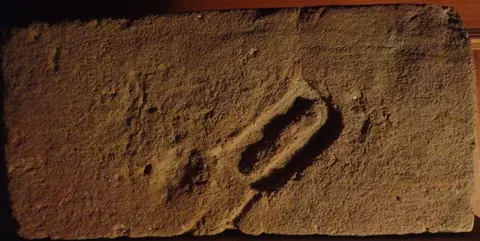 Značka D