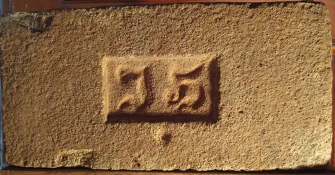 Značka J.H