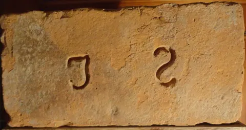 Značka J S