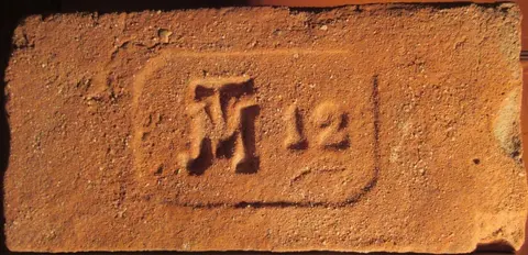 Značka JTM 12