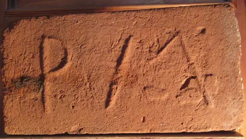 Značka P M