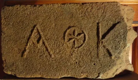 Značka A hvězdička v kolečku K