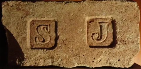 Značka S J
