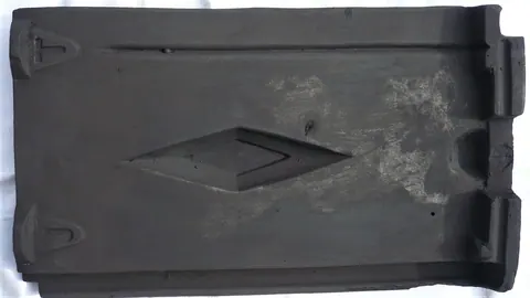 Značka J T.